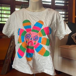 White graphic tee. Used but in good condition.